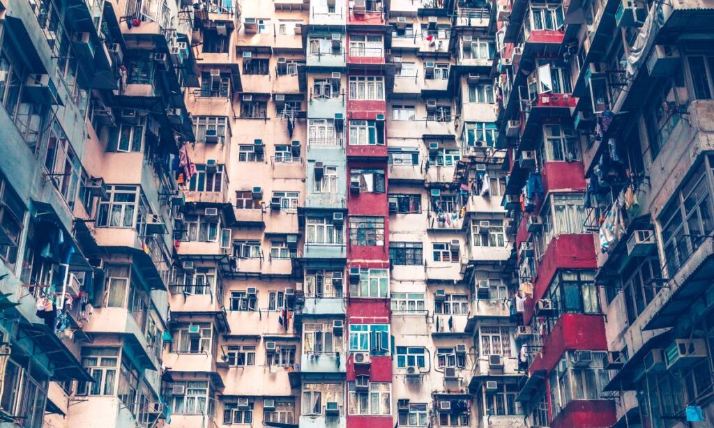 Apartment building in Hong Kong, China with countless air conditioners